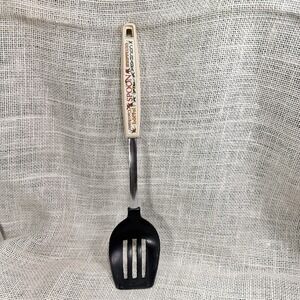 EKCO USA Slotted Spoon Floral Handle Multilingual "Spoon" Kitchen Utensil